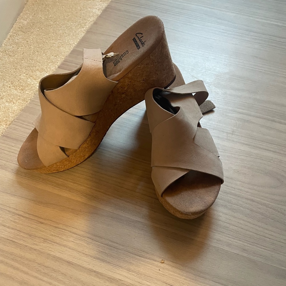 Women’s size 11 beige Clark wedges.